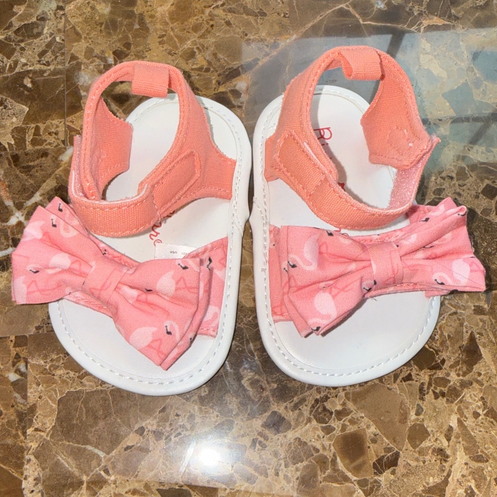 Size 9-12 months baby girls flamingo sandals.